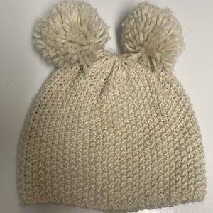 Never worn beanie with Pom poms